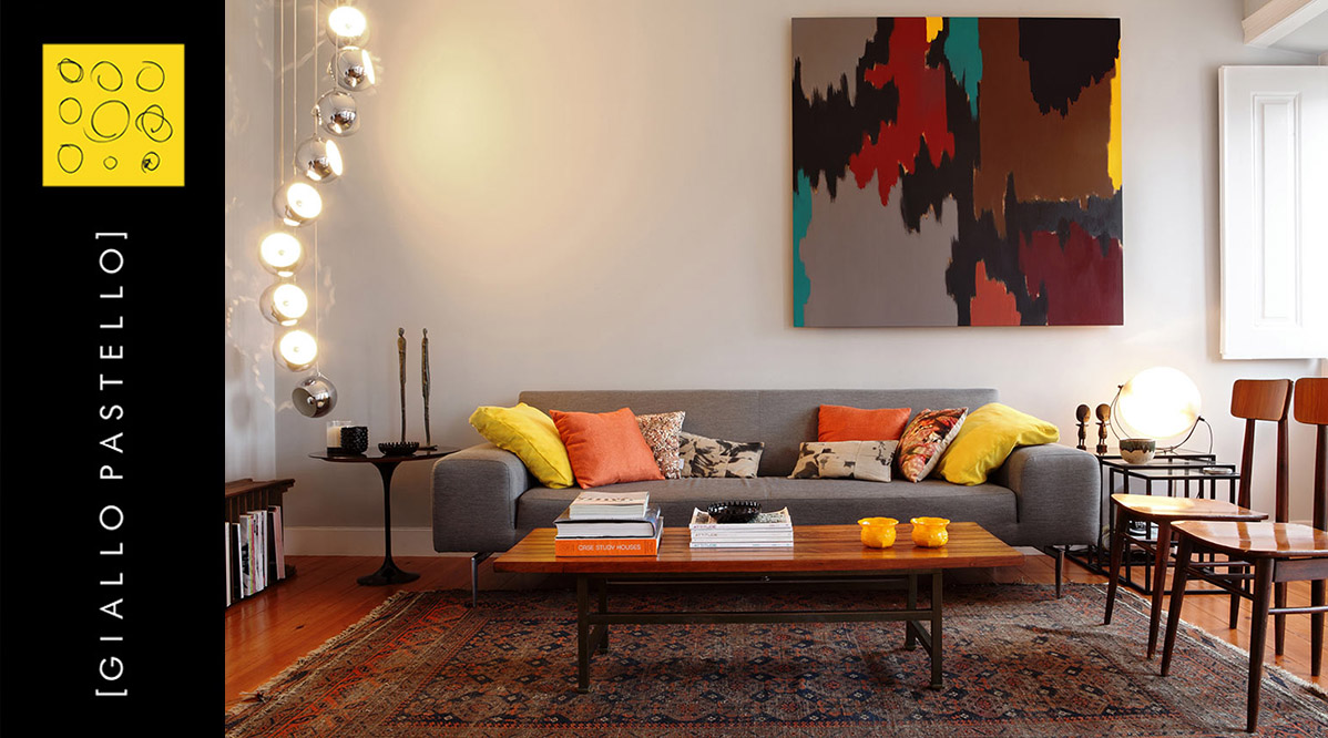 Ristrutturazione appartamento, zona living arredata con colori caldi - Giallo Pastello - Interior Design Brescia Bergamo Milano