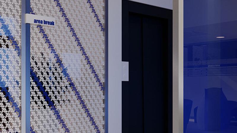 Progettazione di un ufficio innovativo: scrivania con logo - Giallo Pastello Interior Design Brescia Milano